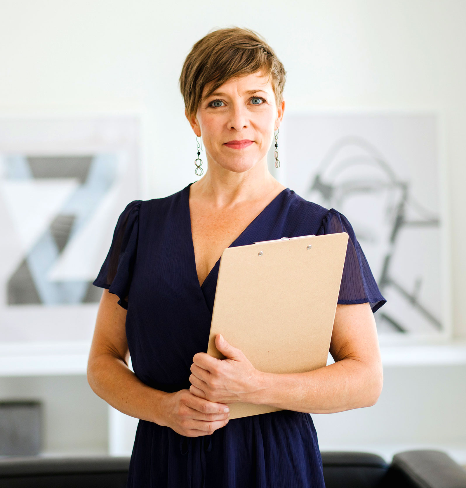 Woman Holding a Clipboard